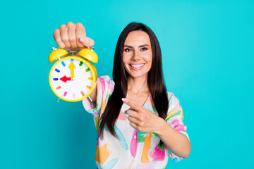 Photo of nice lady indicate finger bell ring clock wear shirt isolated on turquoise color background