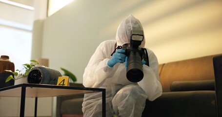 Csi, photographer and forensic at crime scene for investigation of house burglary or murder...