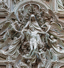 MILAN, ITALY - SEPTEMBER 16, 2024: The detail from main bronze gate of the Cathedral -   Deposition (Pieta) by Ludovico Pogliaghi (1906). - 775305095