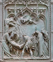 Tuinposter MILAN, ITALY - SEPTEMBER 16, 2024: The detail from main bronze gate of the Cathedral -   Burial of Jesus in the temple -  by Ludovico Pogliaghi (1906). © Renáta Sedmáková