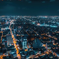 Fototapeta premium Aerial view of a city at night, perfect for urban landscape concepts