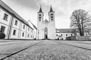Premonstratensian Monastery from 12th century and the Romanesque church of Annunciation of Virgin Mary. Milevsko, Czech Republic. - obrazy, fototapety, plakaty