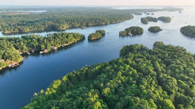 Aerial video of St. Lawrence river in 1000 Islands near US boarder and Hill Island looking away from the 1000 Islands Bridge.