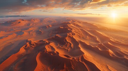 Vast desert landscape  aerial view of dunes at sunset with intricate natural patterns