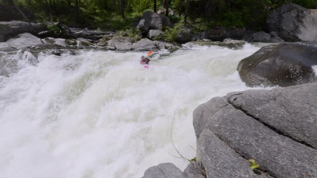 Extreme Whitewater Kayaking Over Class 5 Rapids