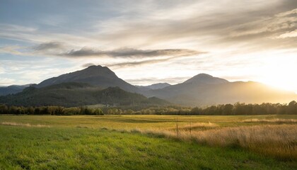 green field and mountains