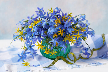 Bouquet in a vase of spring blue and yellow flowers, still life, beautiful postcard - 775360000