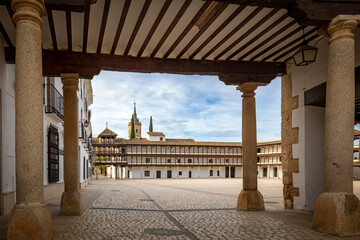 North entrance to the monumental Plaza Mayor of Tembleque de Toledo, Castilla la Mancha, Spain, with its wooden balconies