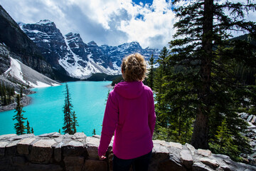 Young woman in Moraine lake, Banff National Park, Canada