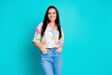 Photo of nice lady put hands pockets empty space wear shirt isolated on turquoise color background