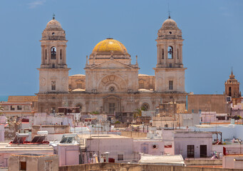 Cathedral of the Holy Cross on the Cadiz waterfront on a sunny day. - 775381082