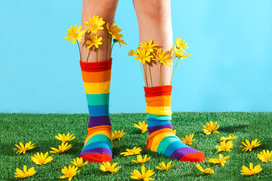 Spring vibes with colorful socks and yellow flowers