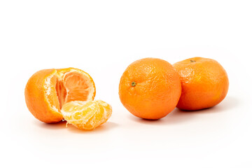 Tangerine or clementine isolated on white background. Ripe mandarin citrus isolated tangerine mandarine orange on white background