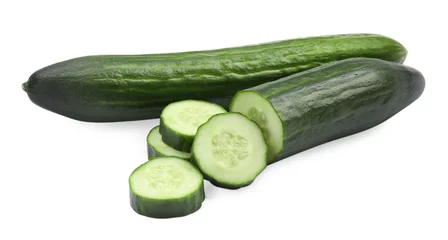 Poster Whole and cut long cucumbers isolated on white © New Africa