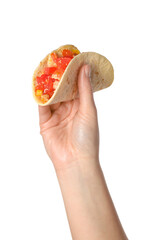 Woman holding delicious taco with vegetables on white background, closeup