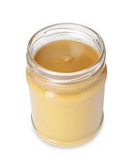 Foto op Canvas Fresh tasty mustard sauce in glass jar isolated on white © New Africa