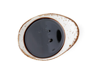 Tasty pomegranate sauce in gravy boat isolated on white, top view