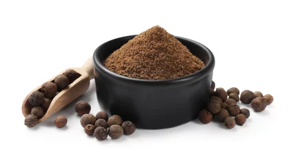 Badezimmer Foto Rückwand Ground allspice pepper in bowl, grains and scoop isolated on white © New Africa