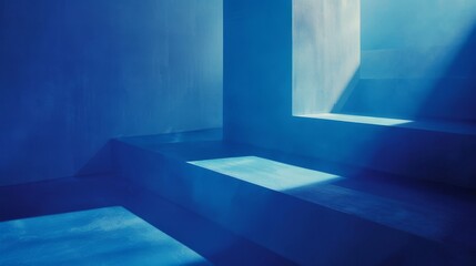 Abstract play of light and shadows in a blue architectural space. The interplay of light and architecture in a blue-hued environment, creating an abstract geometric pattern.