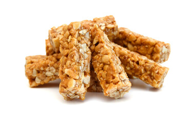 Peanut bars with nuts isolated on white background.