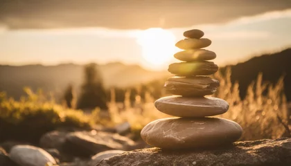 Tuinposter stack of zen stones on nature background © Aedan