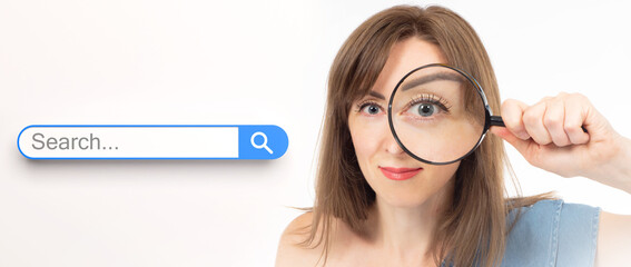 Woman is searching. Girl with magnifying glass. Search bar. Lady with loupe looks at camera. Internet search concept. Woman is looking for information of interest. Searching for data on web - obrazy, fototapety, plakaty