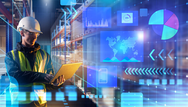 Man develops warehouse tech. Engineer with laptops in storage hangar. Manager uses logistics analytics service. Warehouse racks around worker. Man in sergeant uniform and helmet. Storage tech