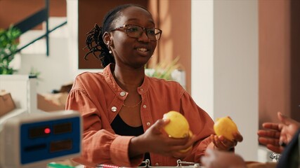 Vegan client buying fruits and vegetables from trusty vendor, searching for chemicals free pantry...