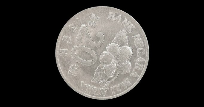 Obverse of Malaysia coin 20 sen 2001, isolated in black background. Loopable animation in 4k resolution video.