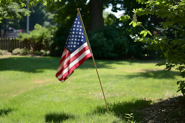 July 4 celebration: American flag proudly waving at a barbecue in the park, symbolizing unity and freedom