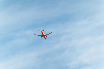 Airplane before landing in blue sky, Boeing 737-82R