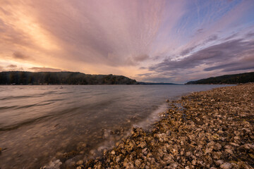 Colorful and moody sunset sky landscape seascape on the shores of the Puget Sound, Pacific Northwest, Washington State