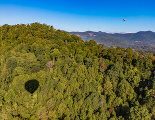 Hot Air Balloons soaring through Asheville NC Smokey Mountains