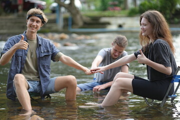 Group of Young man and woman enjoy and fun outdoor lifestyle travel nature forest mountain on summer holiday vacation. FRIENDS IN NATURE ENGAGED IN OUTDOOR ACTIVITIES.