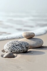 Fototapeta na wymiar Minimalist, abstract background, A pile of rocks atop the sandy beach, creating a natural and minimalist scene, smooth texture of the sand, Waves gently lap at the shore