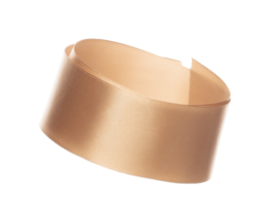 Gold ribbon long straight fly in air with curve roll shiny. Golden ribbon for present gift birthday party to wrap around decorate and make of textile cloth long straight. White background isolated