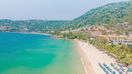 Patong Beach Popular places. afternoon light sky and blue ocean are on the back of white Phuket sea...