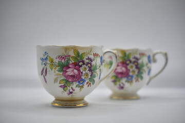 vintage porcelain tea cup with floral patterb