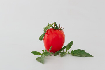 Red ripe tomatoes on a white background