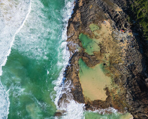 Aerial views of Champagne Pools geological formation on the sand island of K’gari, Queensland, Australia