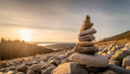 Fotobehang Stenen in het zand stacked stones in nature