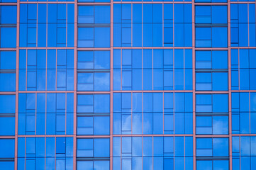 Windows of a Glass Building Reflecting the Sky.
