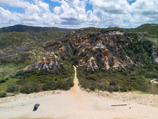 Aerial view of the Pinnacles geological formation along 75 mile beach on the sand island of K’gari, Queensland, Australia