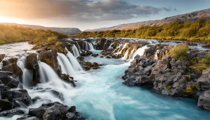 Foto auf Acrylglas wonderful summer view of bruarfoss waterfall secluded spot with cascading blue waters great sunset in iceland europe beauty of nature concept background © Kristopher