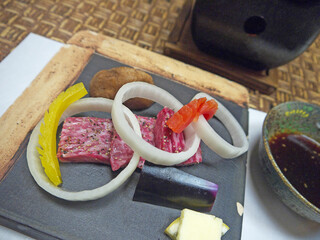 Japanese marbled beef steak set of raw meat with grinded black pepper and vegetables for yakiniku