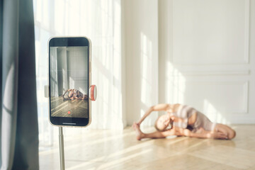 slender blonde takes off her yoga classes on the phone