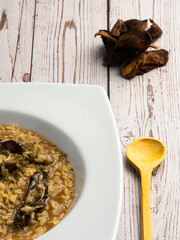 Rustic Mushroom Risotto: Homemade Comfort Food on Vintage Wooden Table