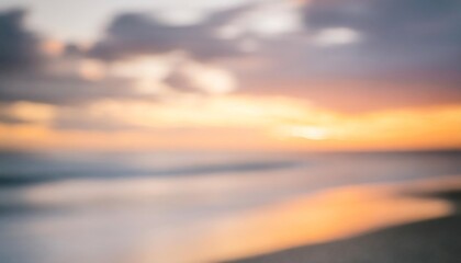 Fototapeta na wymiar beautiful blurred defocused sunset sky and ocean nature background