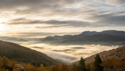 clouds and fog over the mountains in autumn