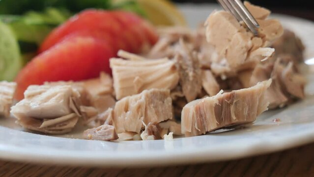 Shred boiled chicken breast. Boiled chicken breasts